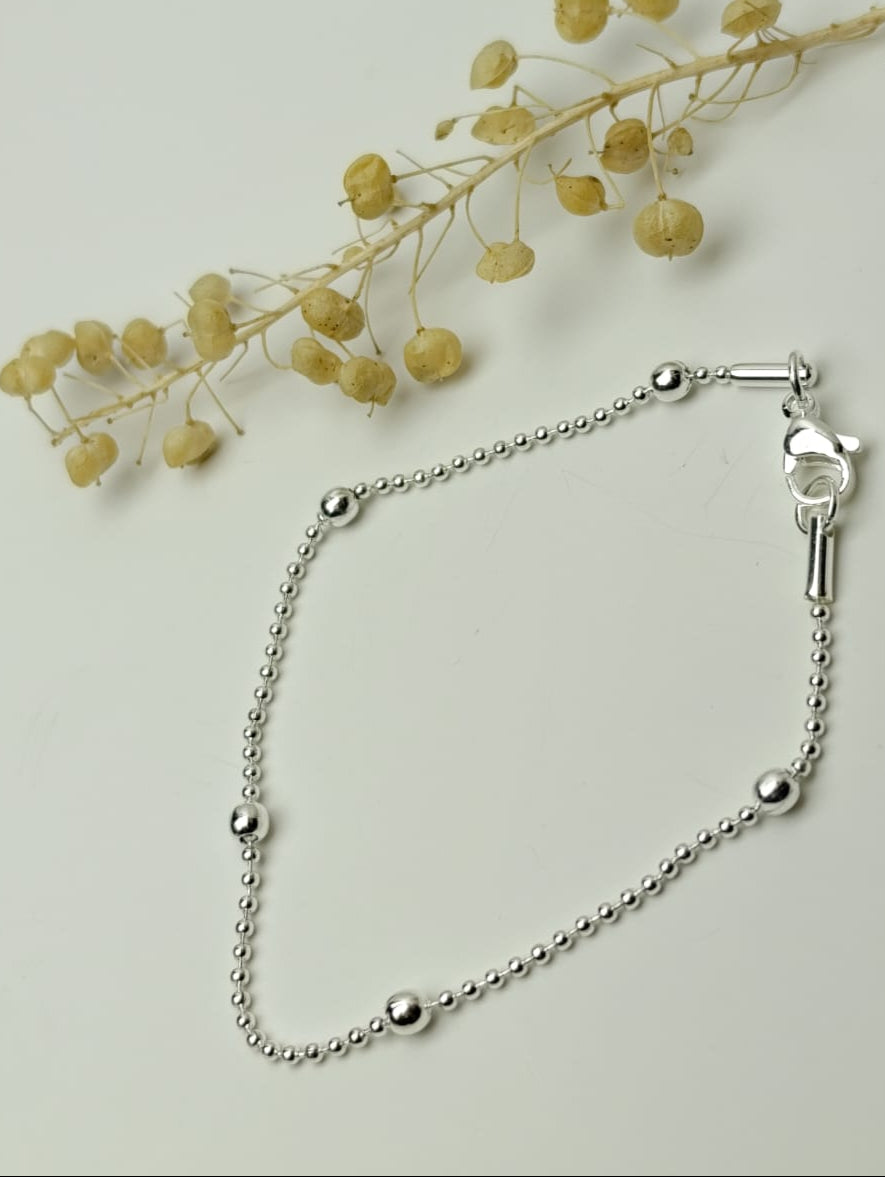 PULSERA PLATEADA EN ACERO BLANCO QUIRURGICO
