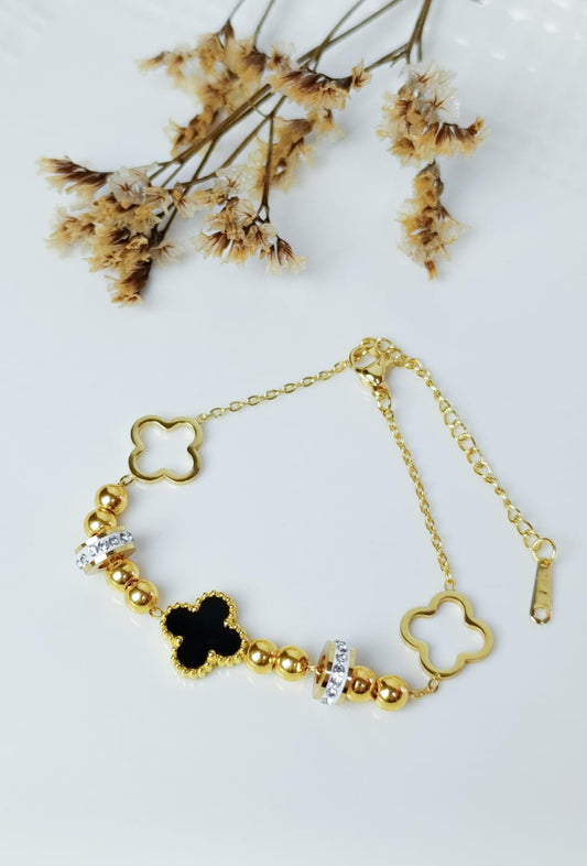 PULSERA DORADA CON TREBOL EN ACERO QUIRURGICO