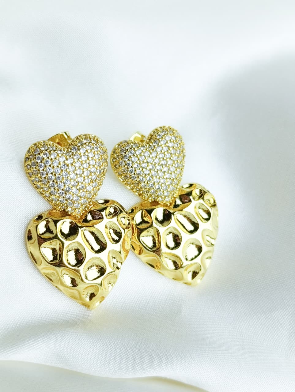 AROS DE ACERO QUIRÚRGICO CON DISEÑO DE DOS CORAZONES