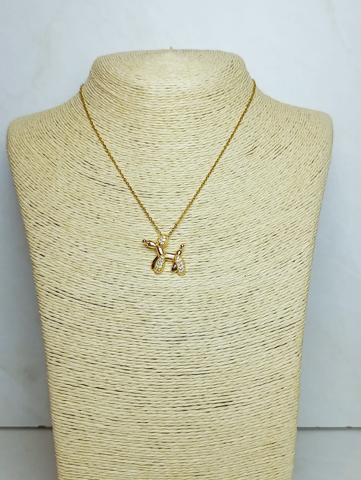 COLLAR GLOBITO PERRITO EN ACERO DORADO