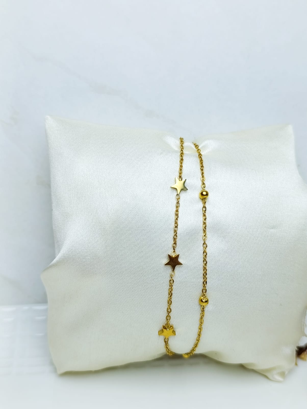PULSERA DOBLE DE ESTRELLAS EN ACERO QUIRURGICO